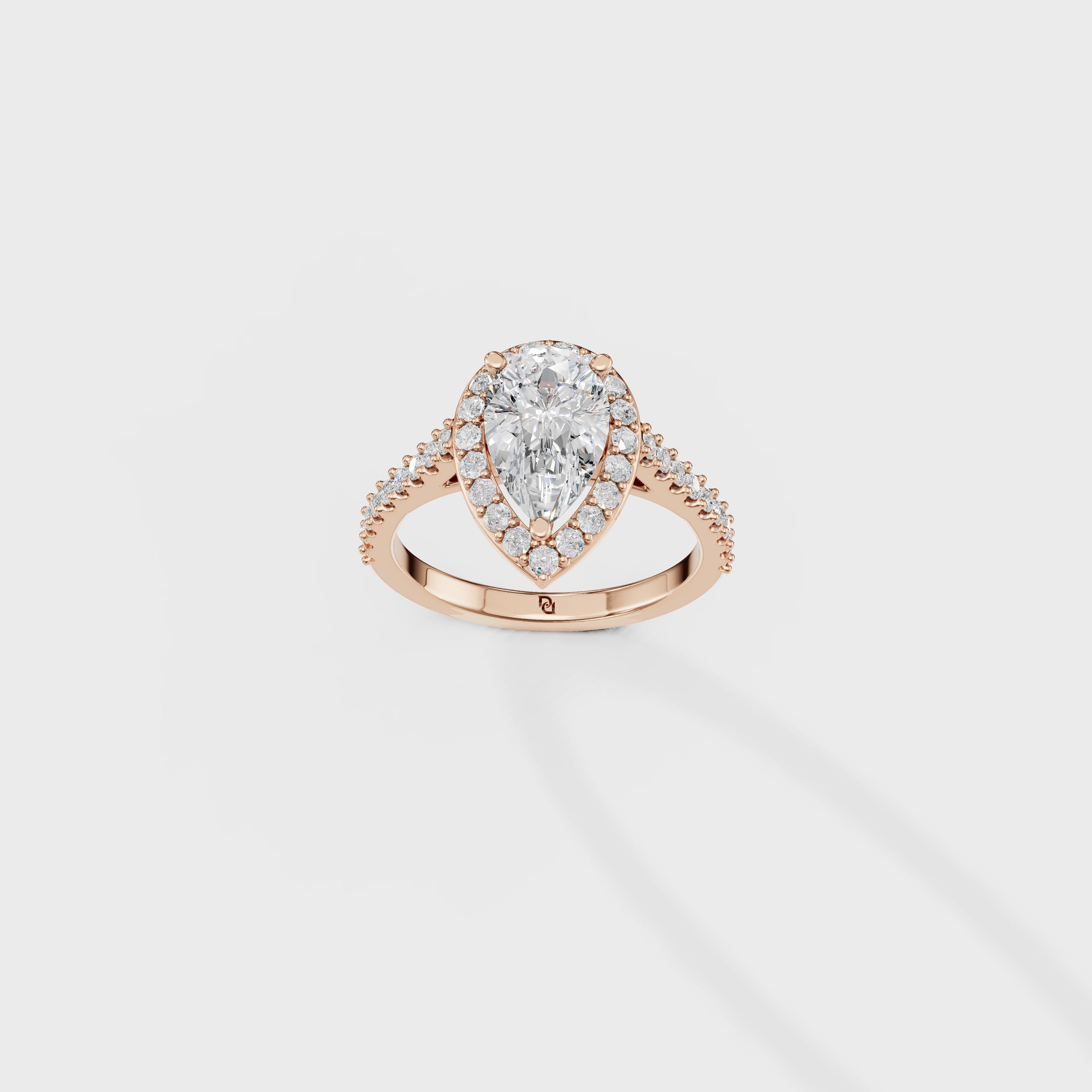 Blushing Halo Pear Diamond Ring
