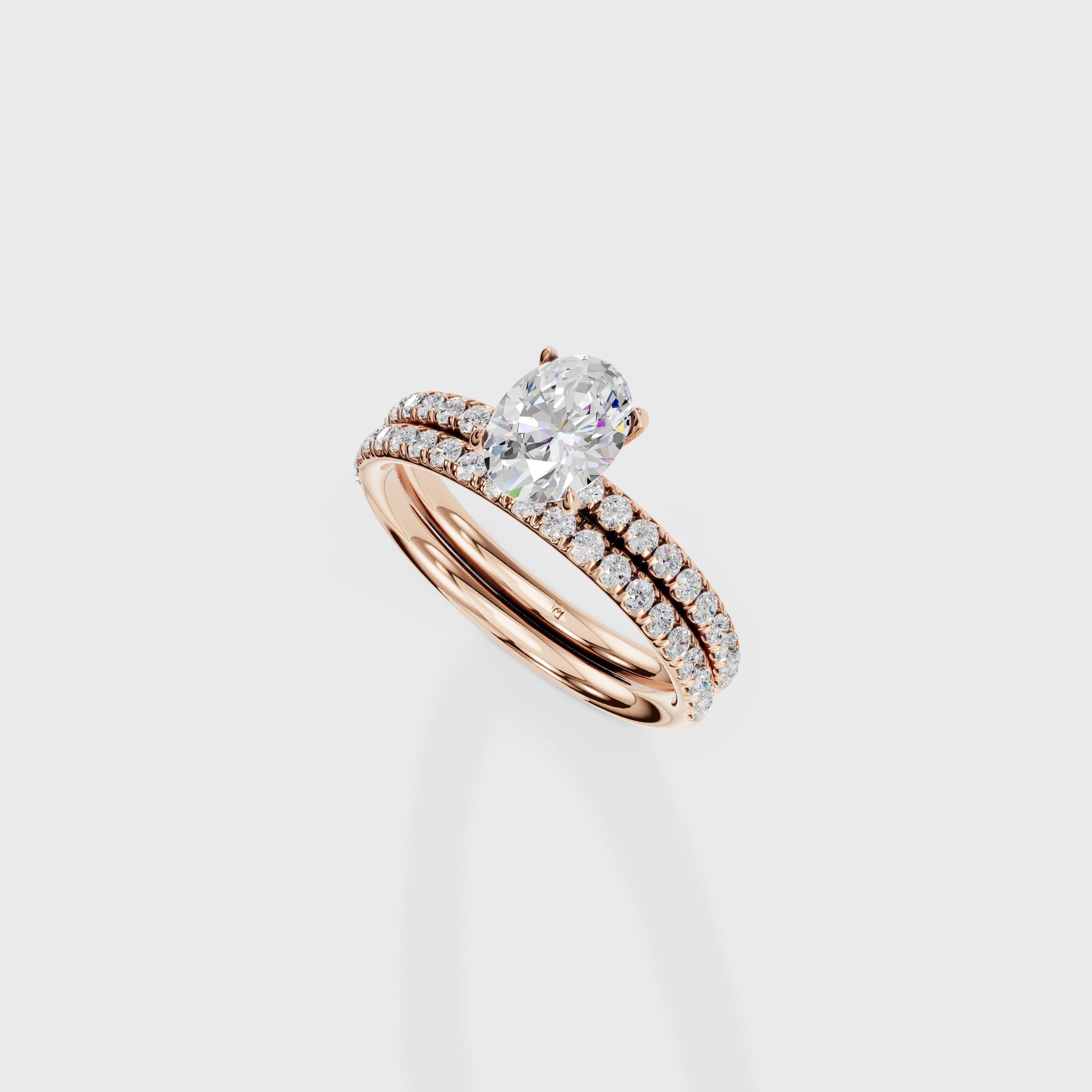 Oval Diamond Solitaire with Pave Wedding Band