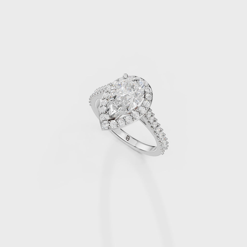 Blushing Halo Pear Diamond Ring