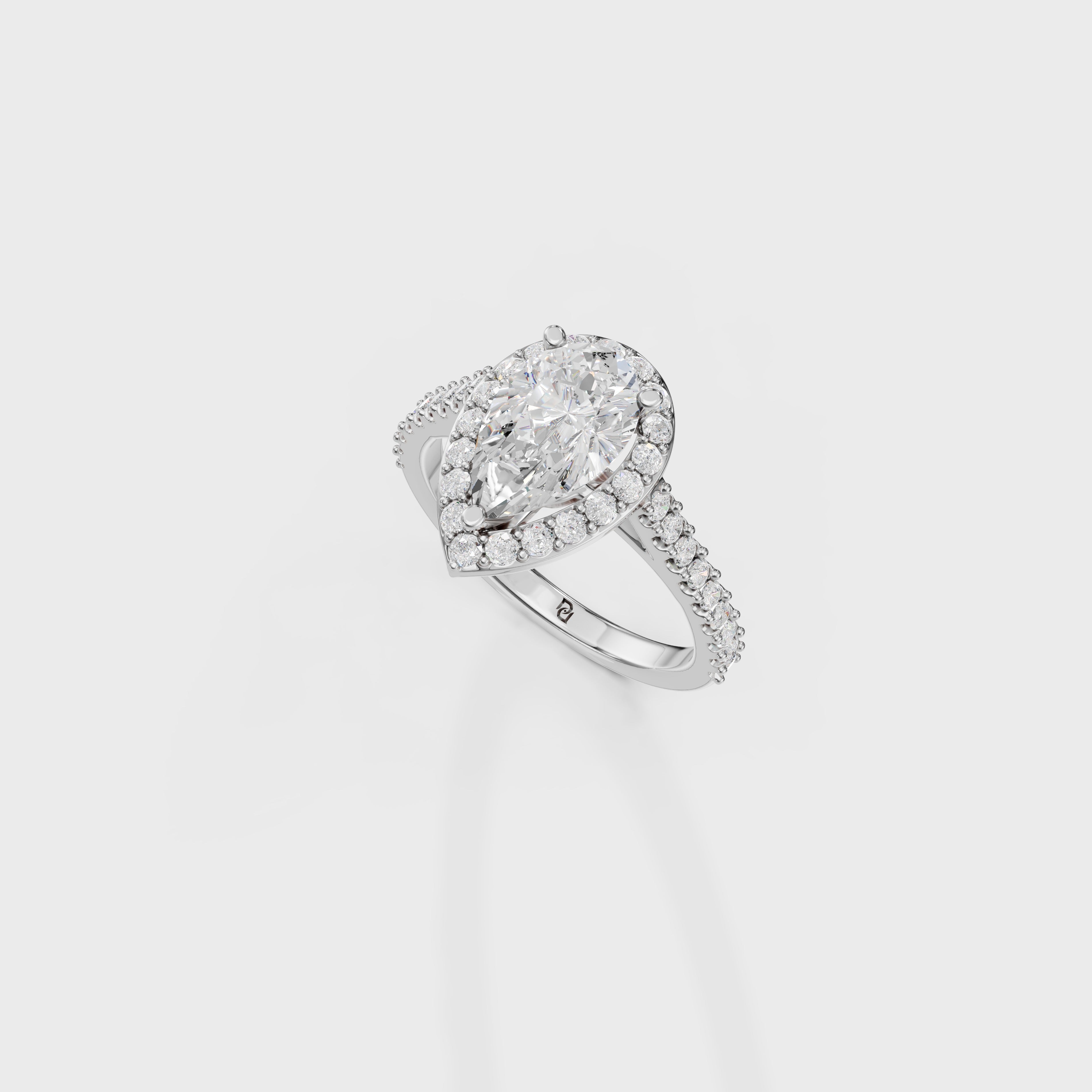 Blushing Halo Pear Diamond Ring