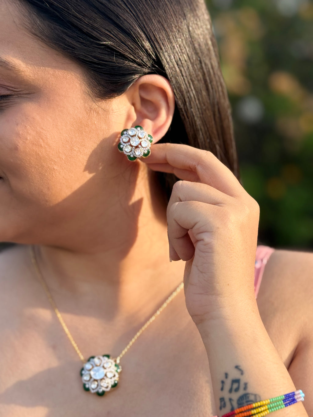 Green stone pendant with earrings