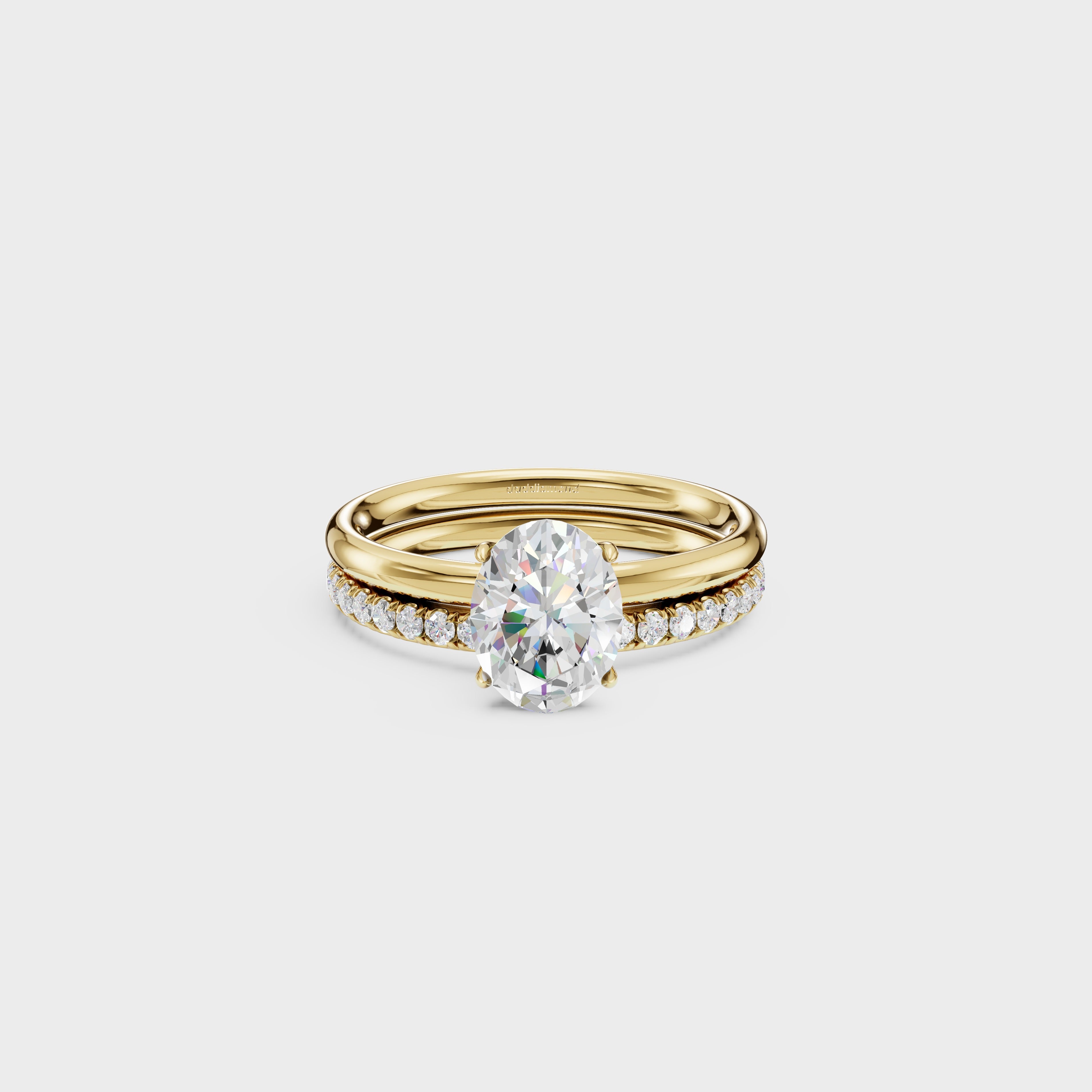 Oval Solitaire Diamond Bridal Set With Pave Band