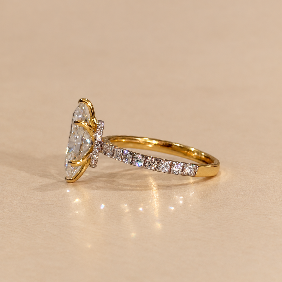 Marquise Solitaire Engagement Ring with Diamond Accents