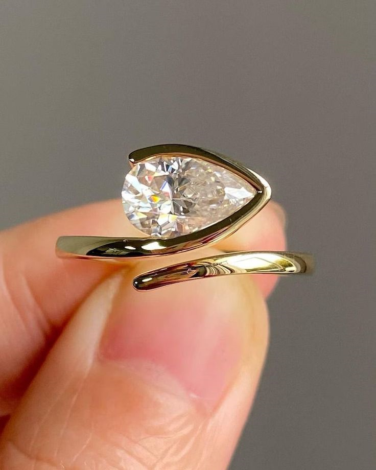 Curved Bypass Pear Ring