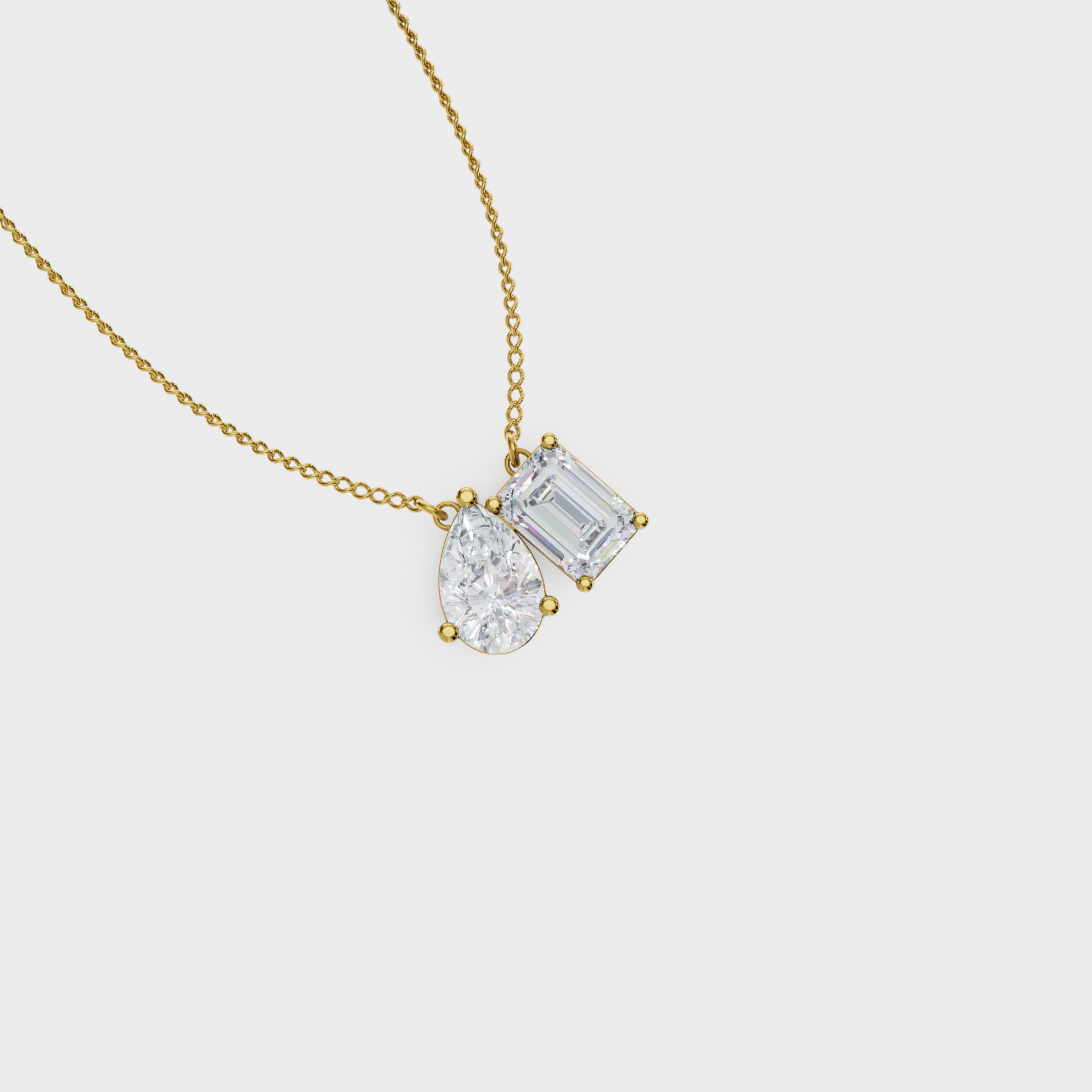 Symphony Emerald And Pear Cut Diamond Pendant