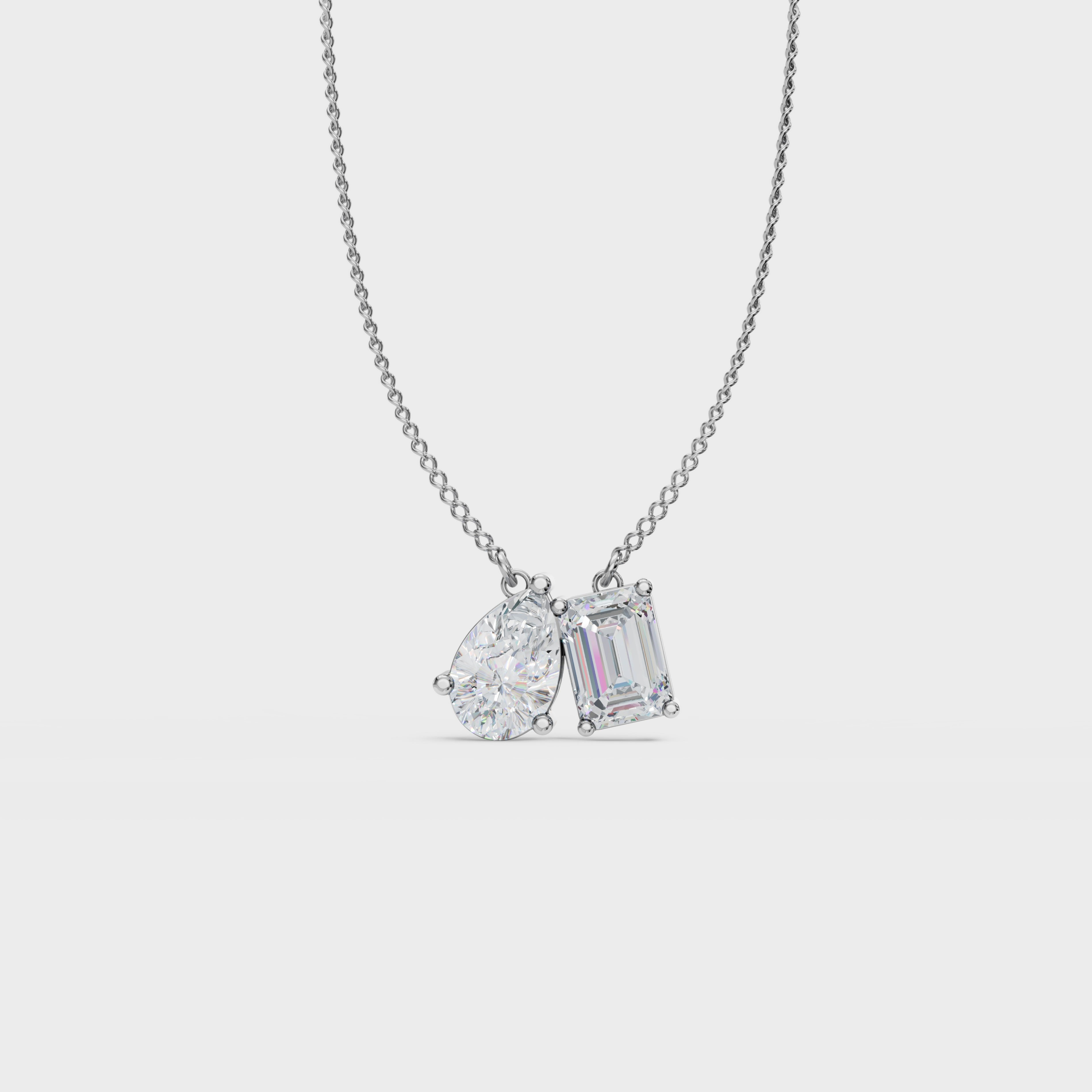 Symphony Emerald And Pear Cut Diamond Pendant