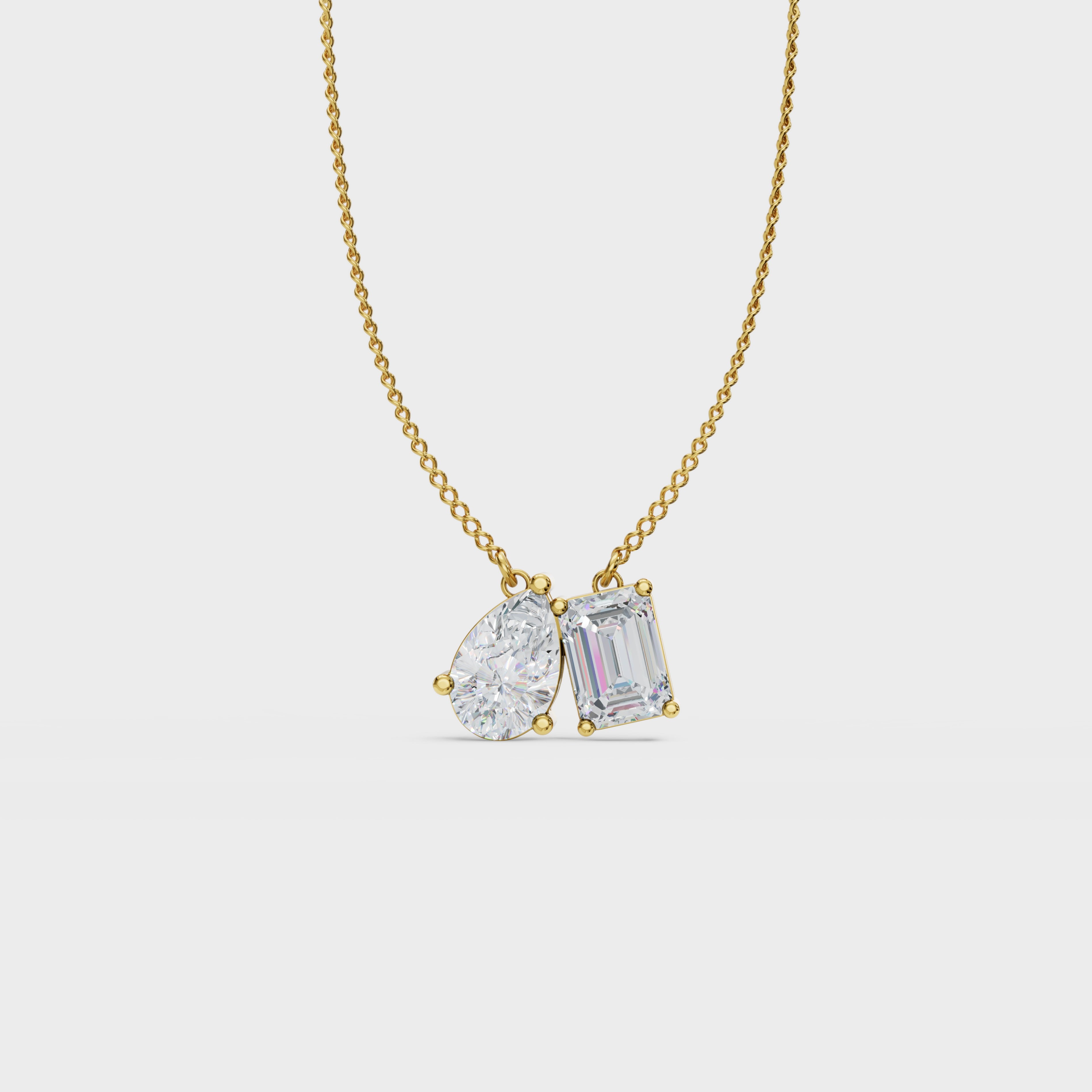 Symphony Emerald And Pear Cut Diamond Pendant