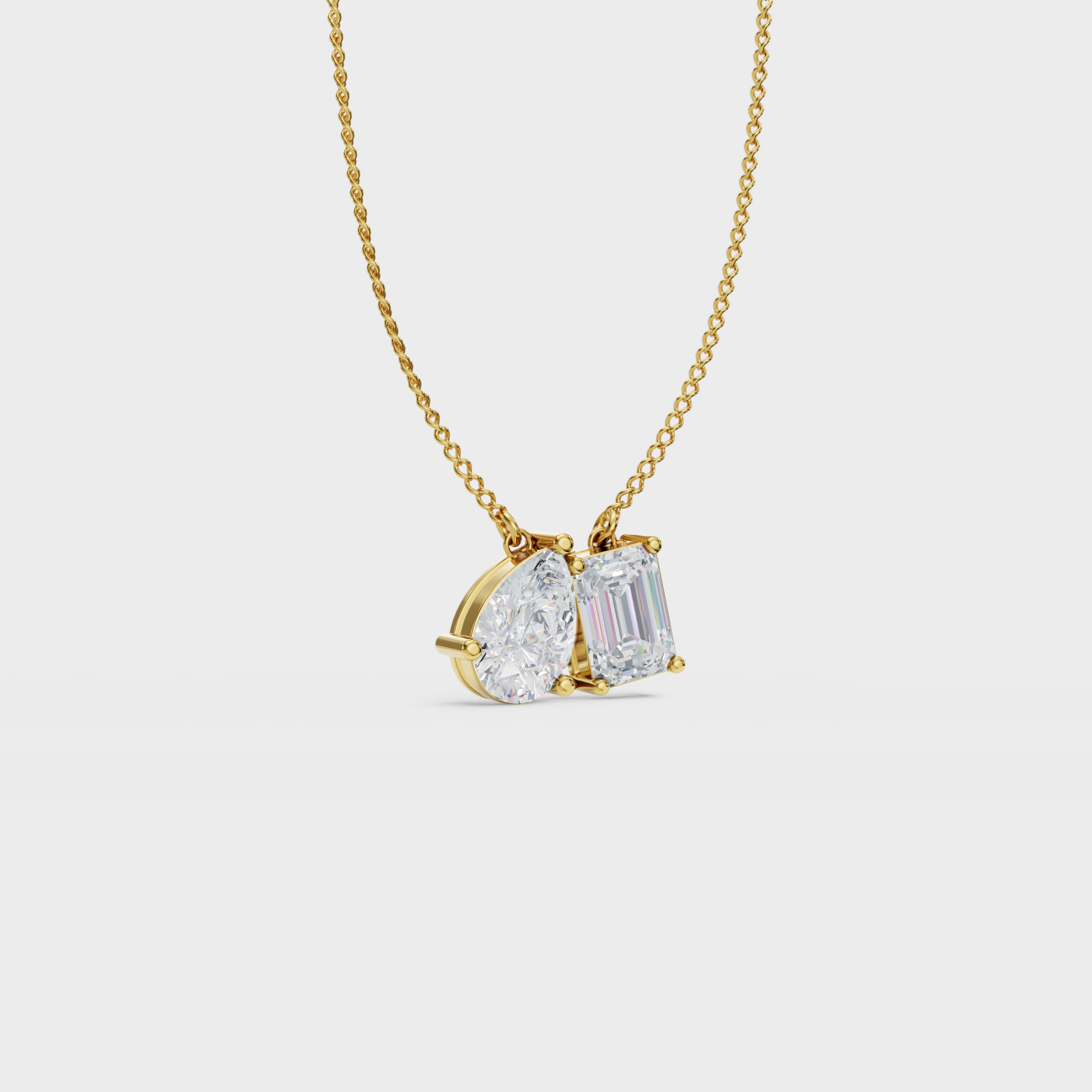 Symphony Emerald And Pear Cut Diamond Pendant