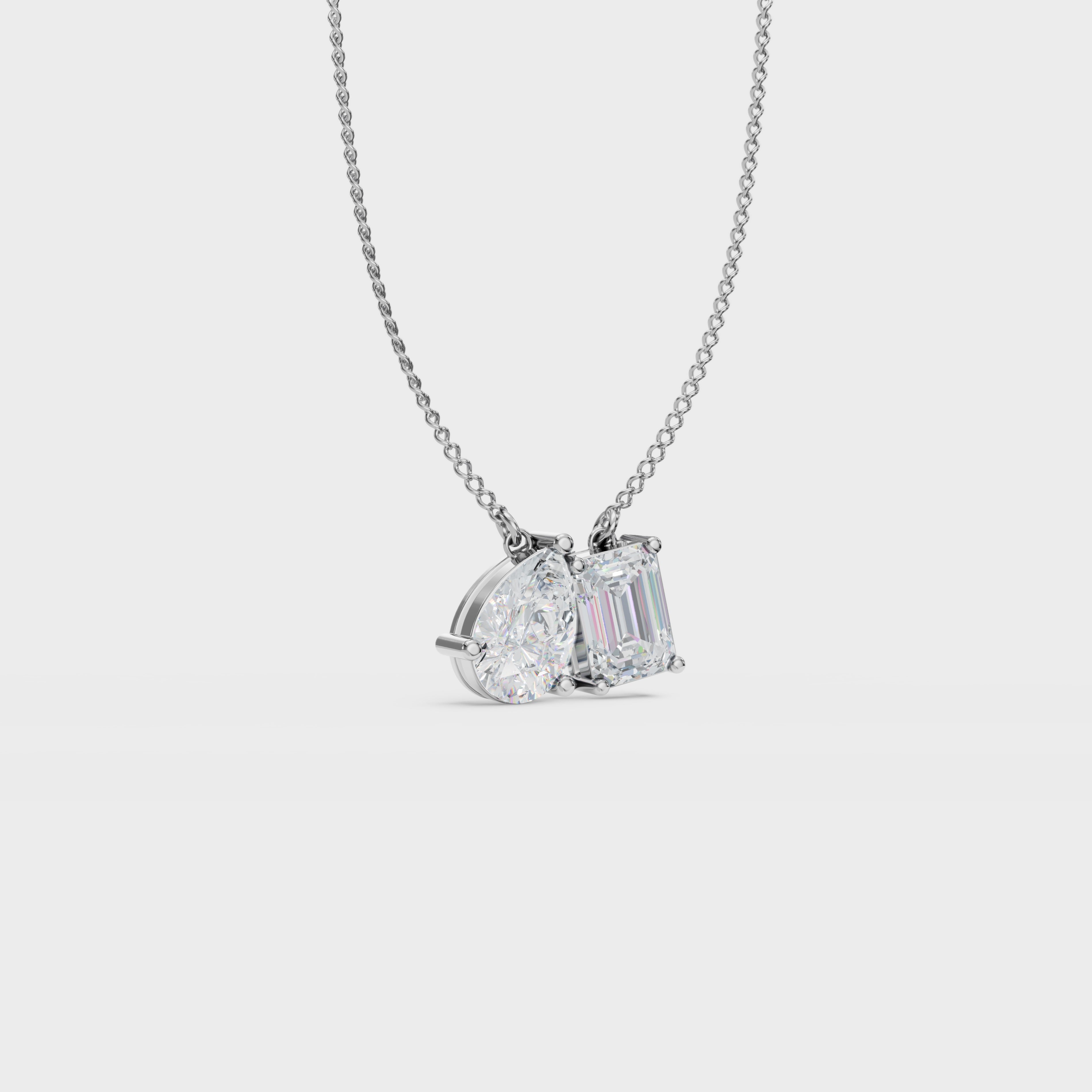 Symphony Emerald And Pear Cut Diamond Pendant