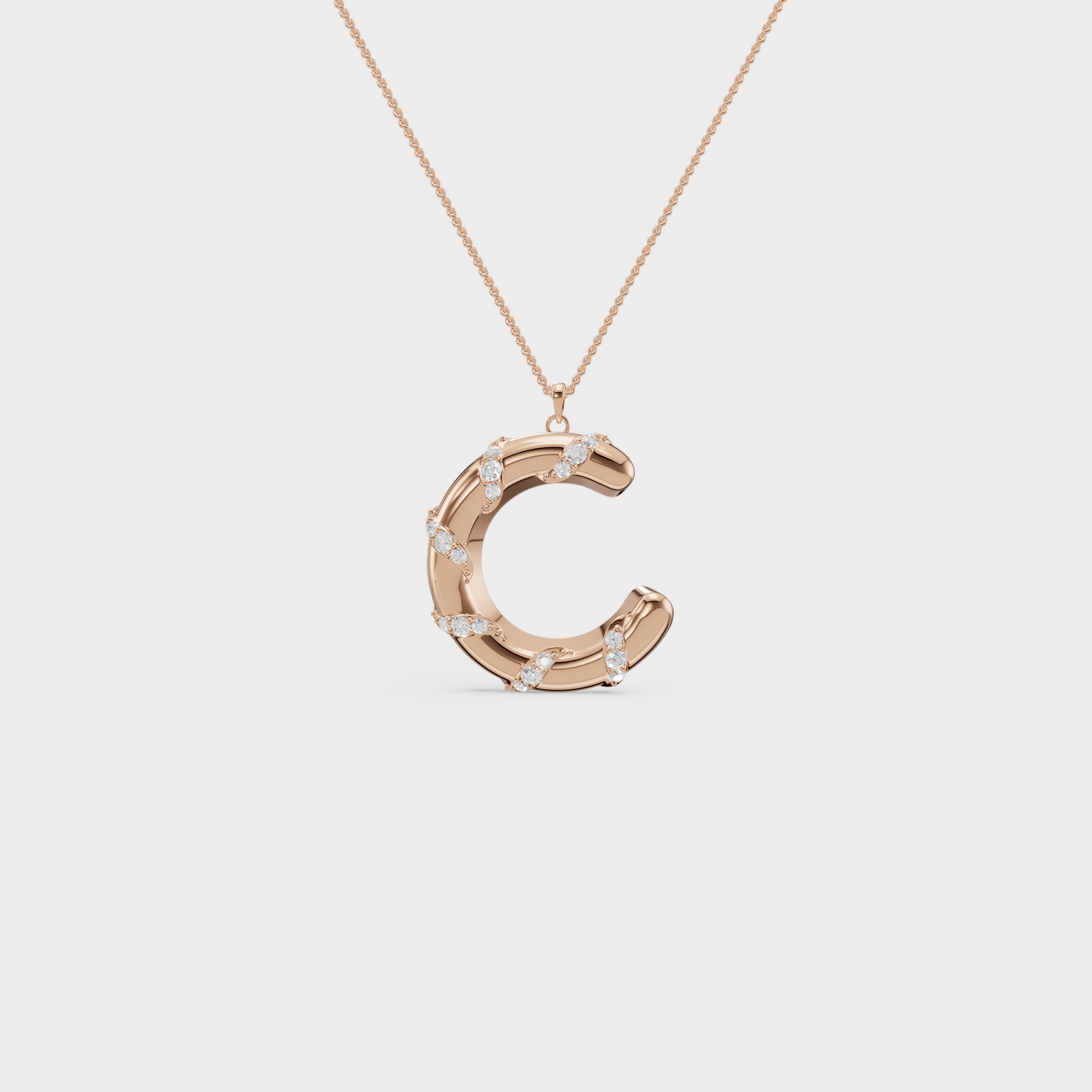 Monogram C diamond swirl pendant