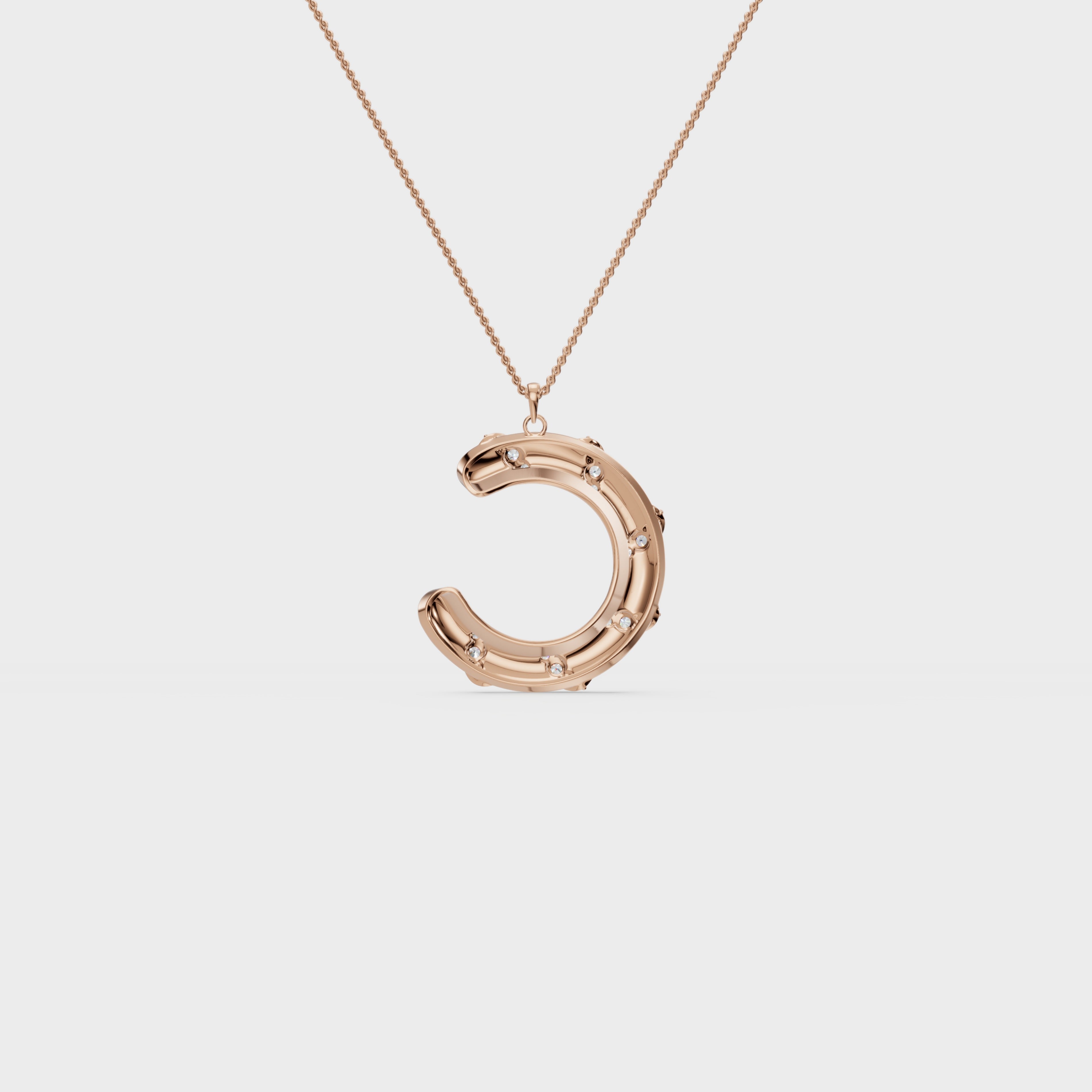 Monogram C diamond swirl pendant