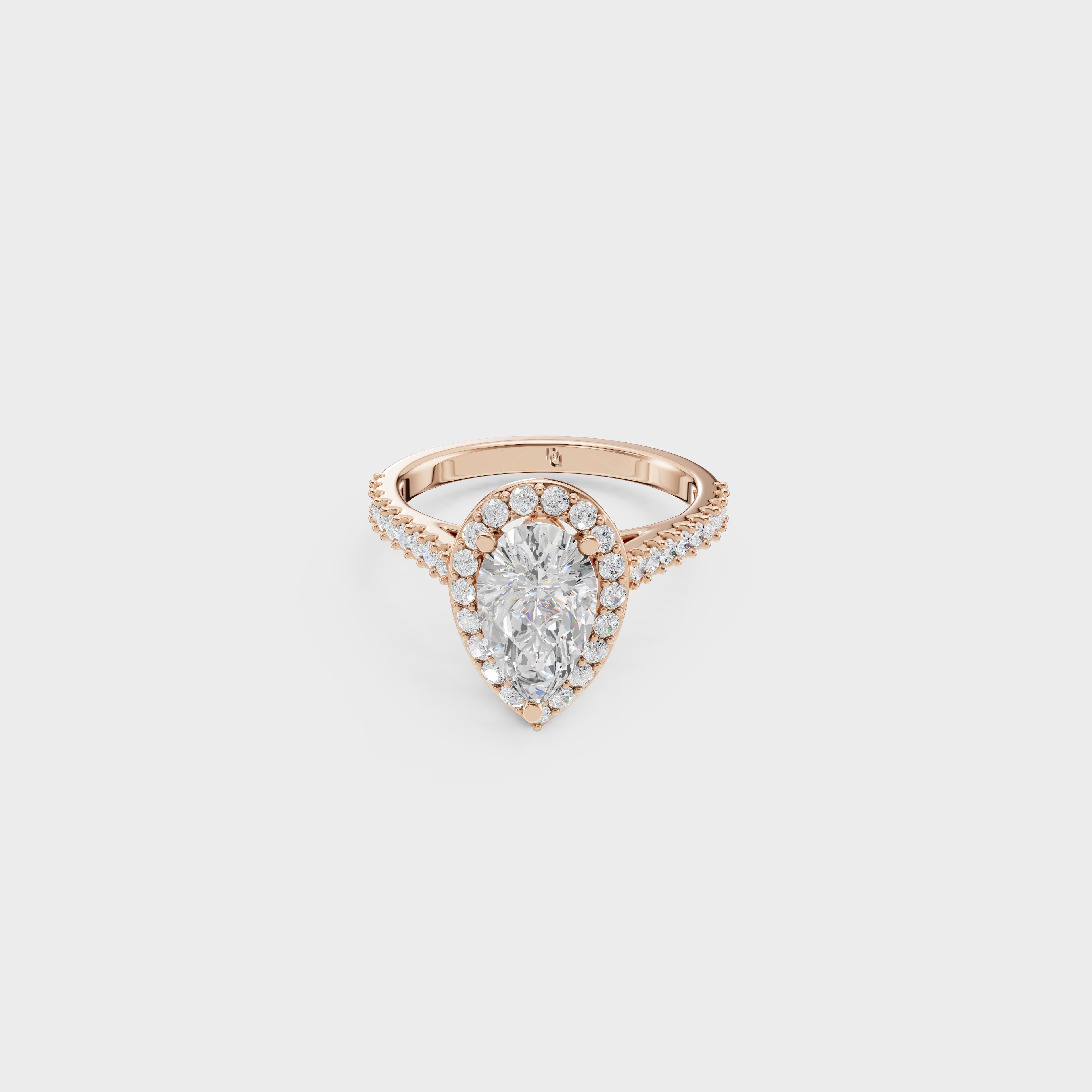 Blushing Halo Pear Diamond Ring