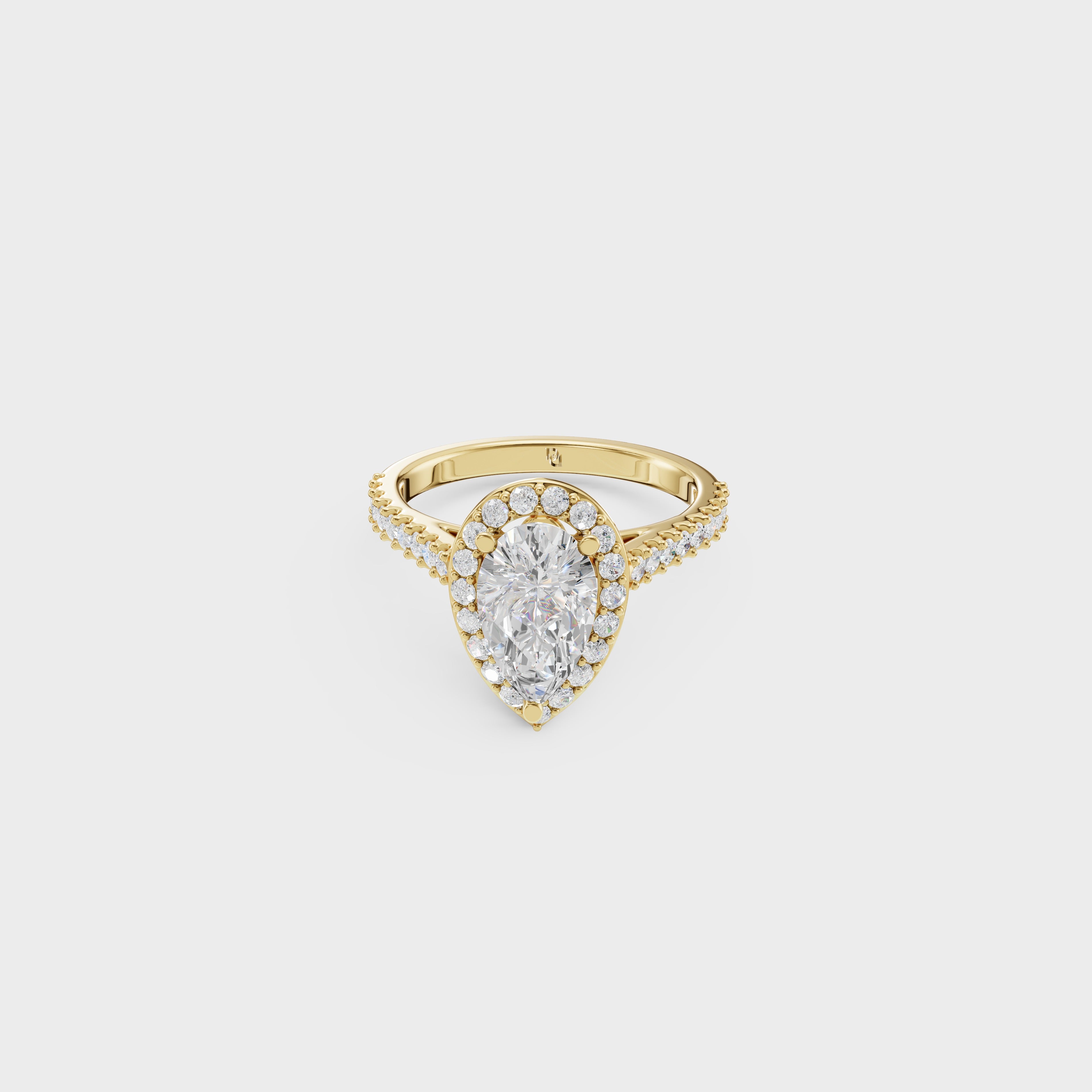 Blushing Halo Pear Diamond Ring