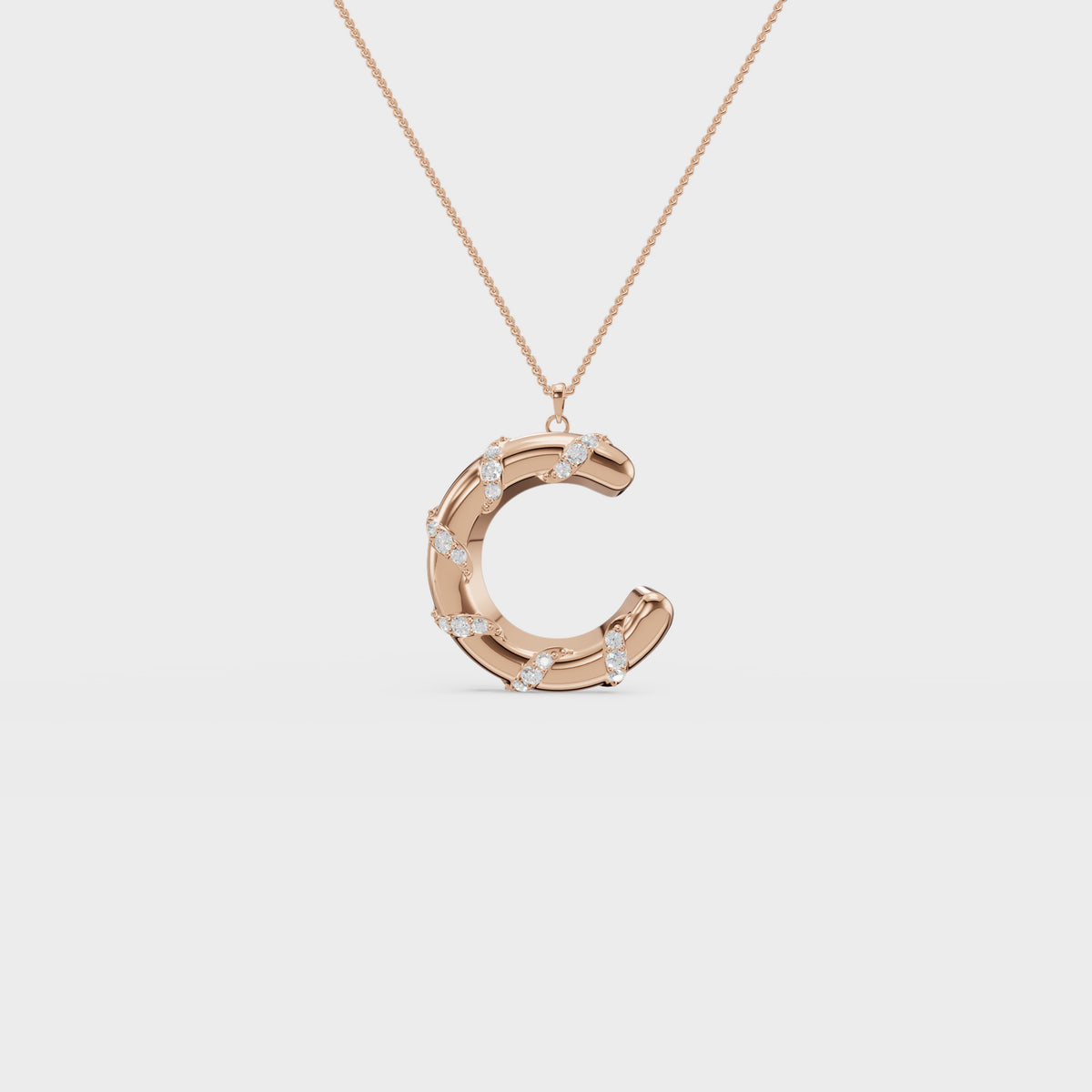Monogram C diamond swirl pendant