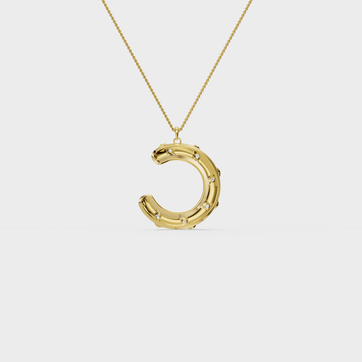 Monogram C diamond swirl pendant