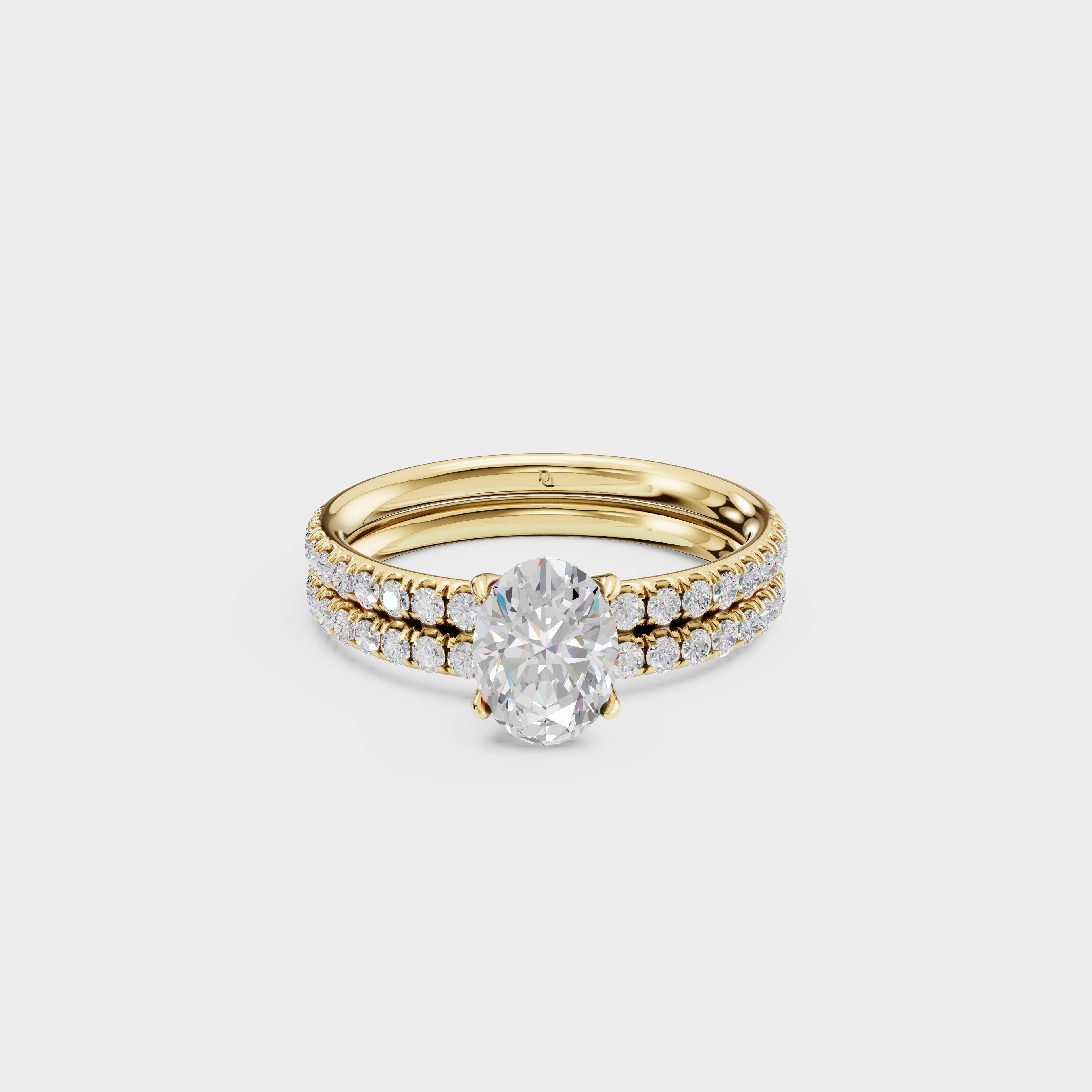 Oval Diamond Solitaire with Pave Wedding Band