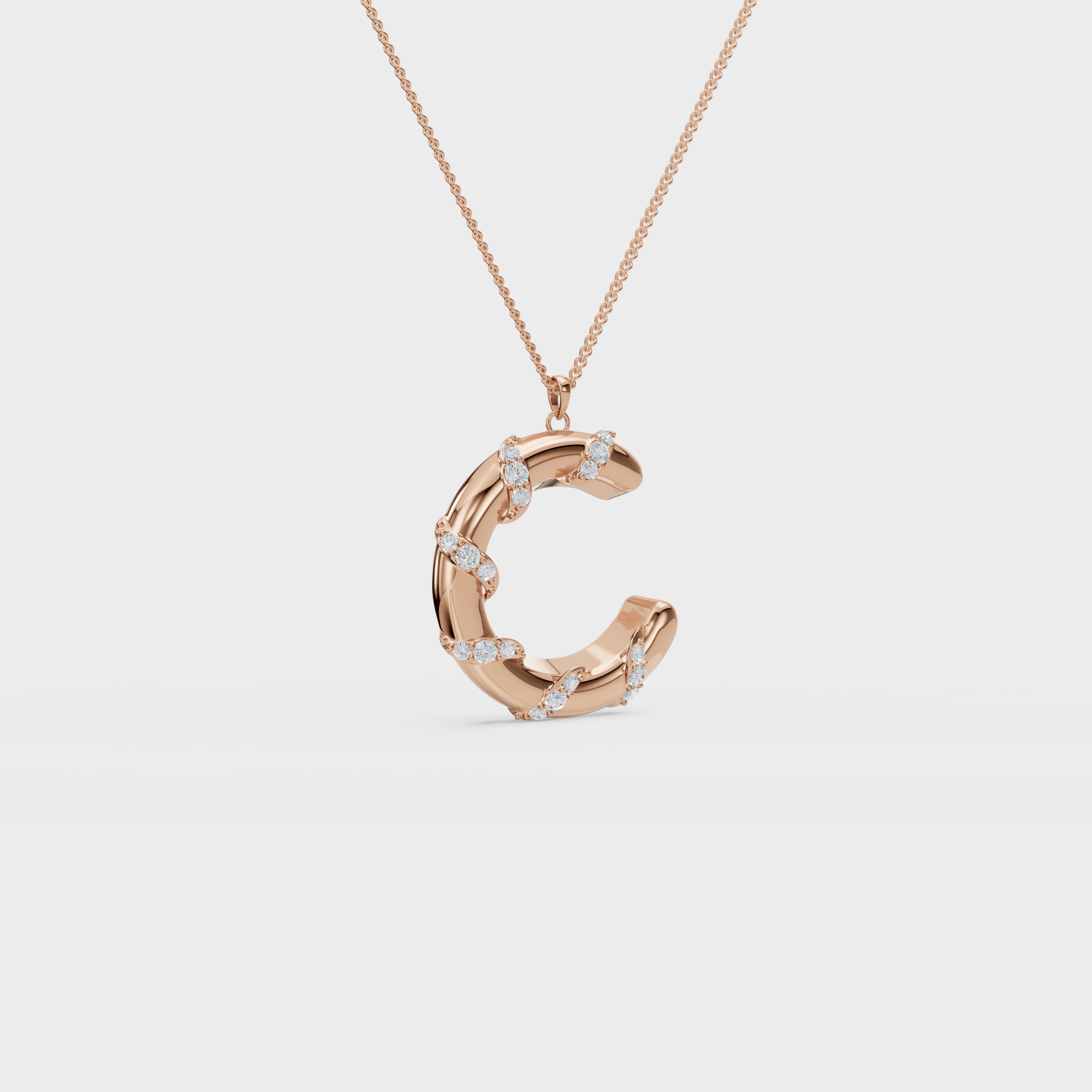 Monogram C diamond swirl pendant