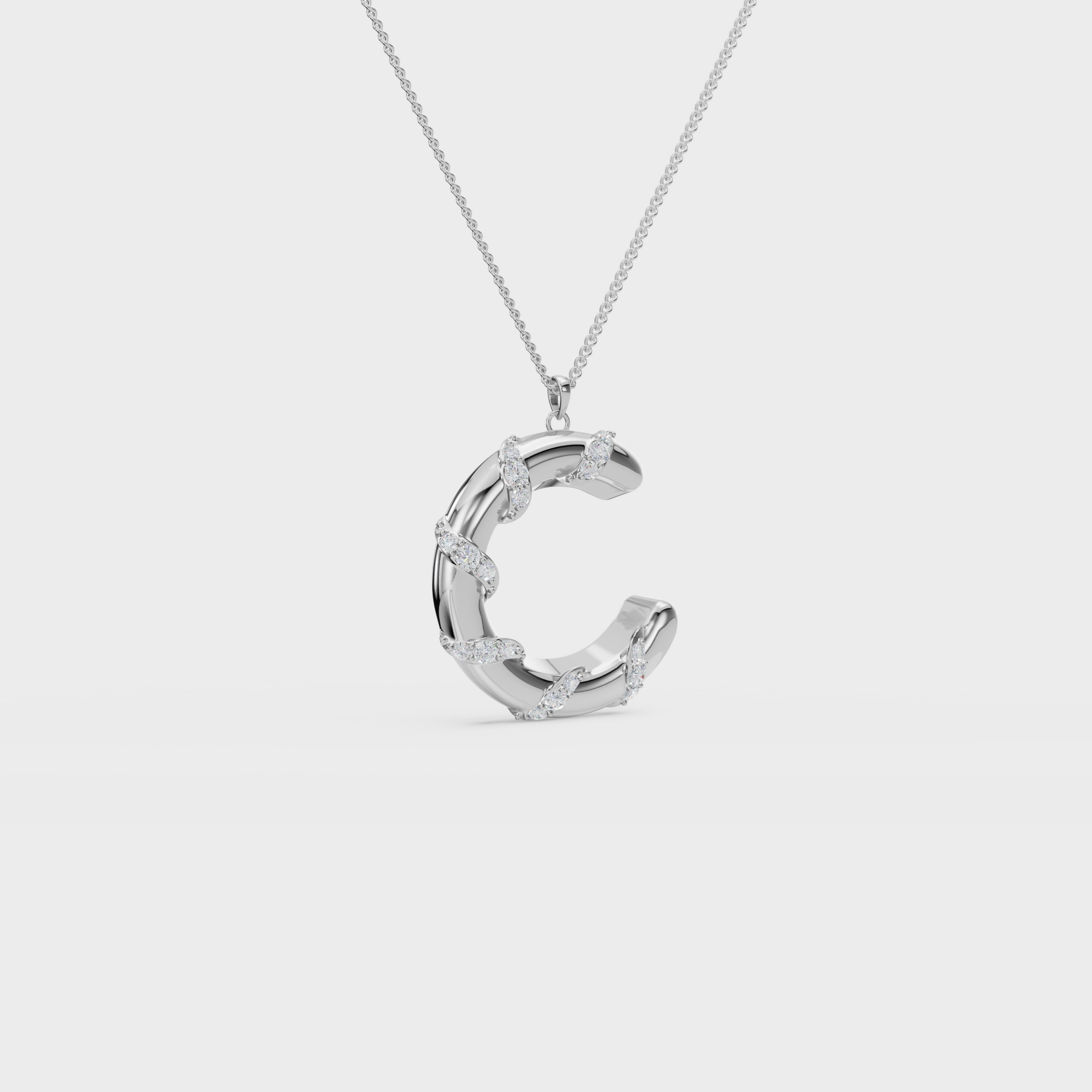 Monogram C diamond swirl pendant