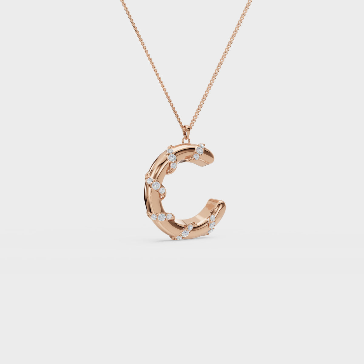 Monogram C diamond swirl pendant