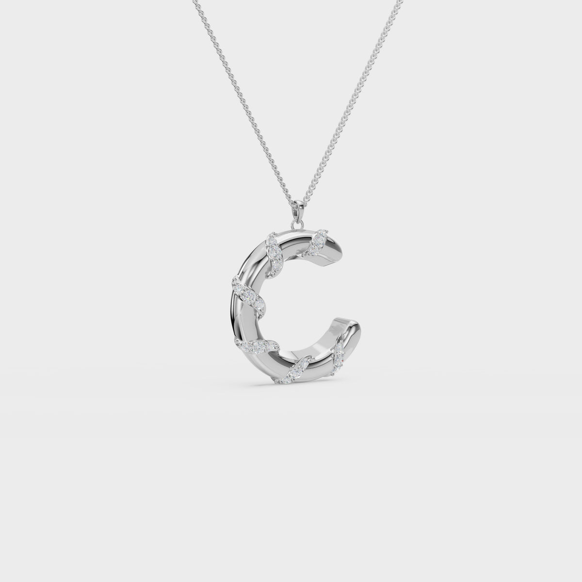 Monogram C diamond swirl pendant