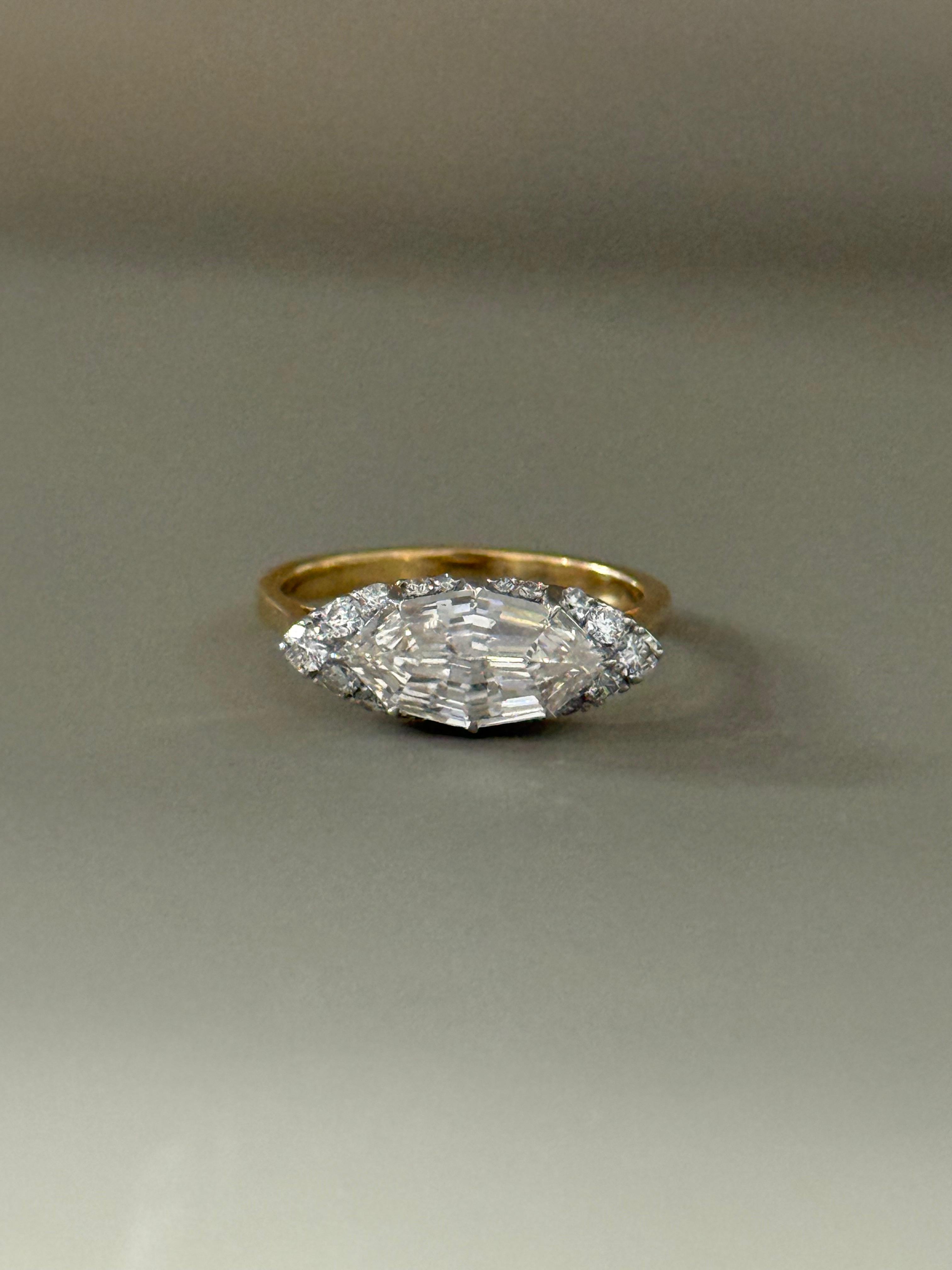 Marquise Step cut Engagement Ring