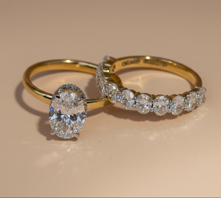 Oval cut diamond hidden halo stackable ring