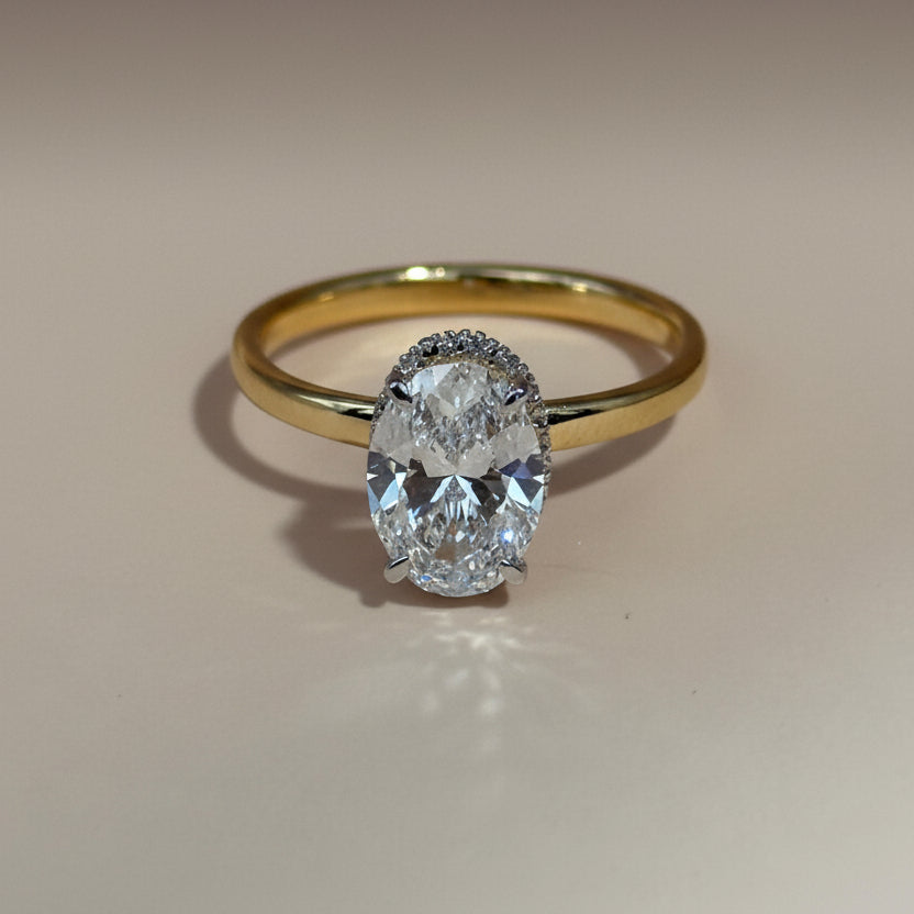 Oval cut diamond hidden halo stackable ring