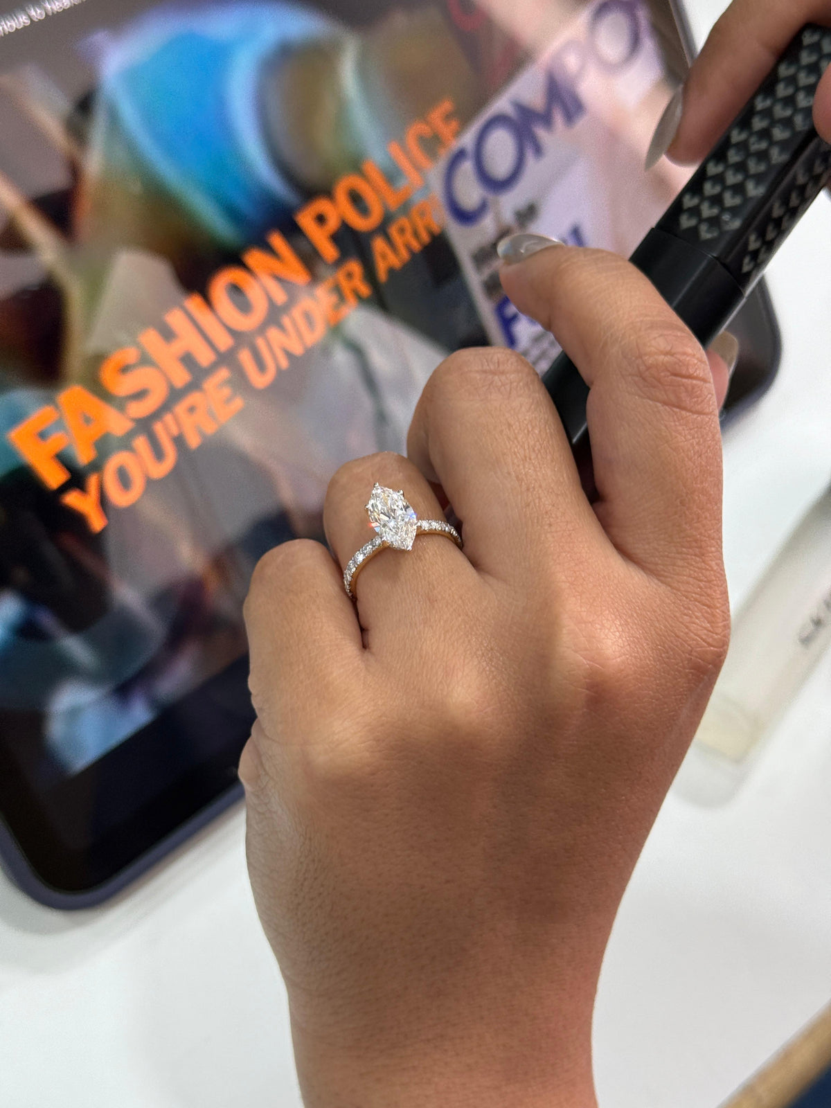 Marquise Solitaire Engagement Ring with Diamond Accents