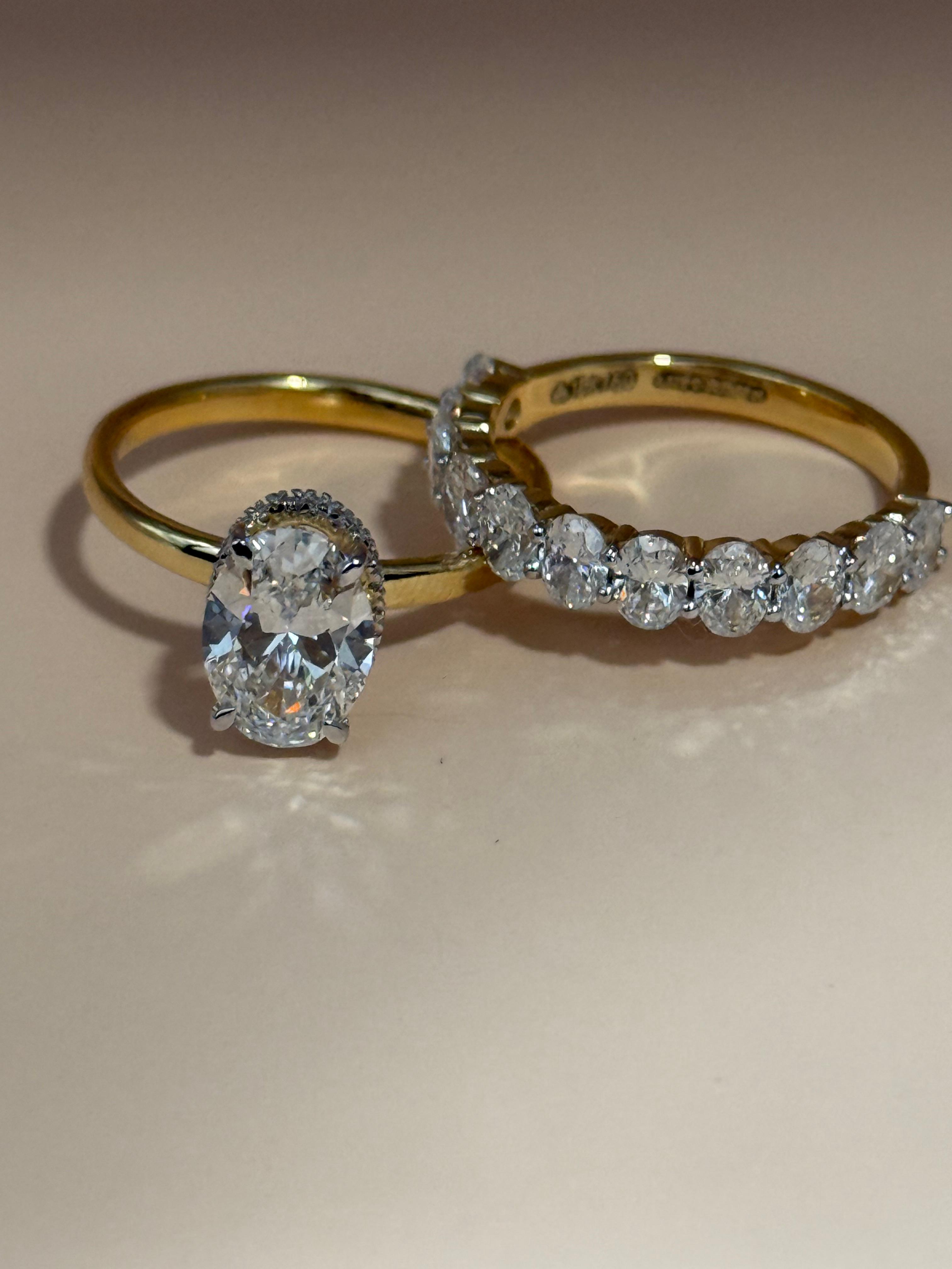 Oval cut diamond hidden halo stackable ring