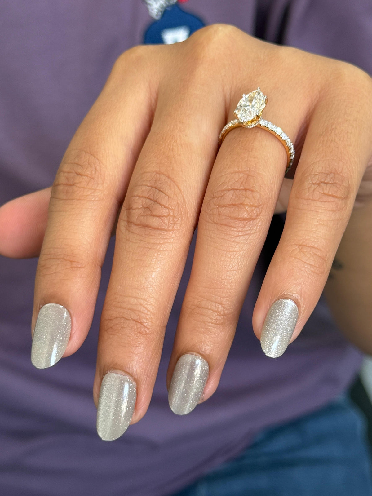 Marquise Solitaire Engagement Ring with Diamond Accents
