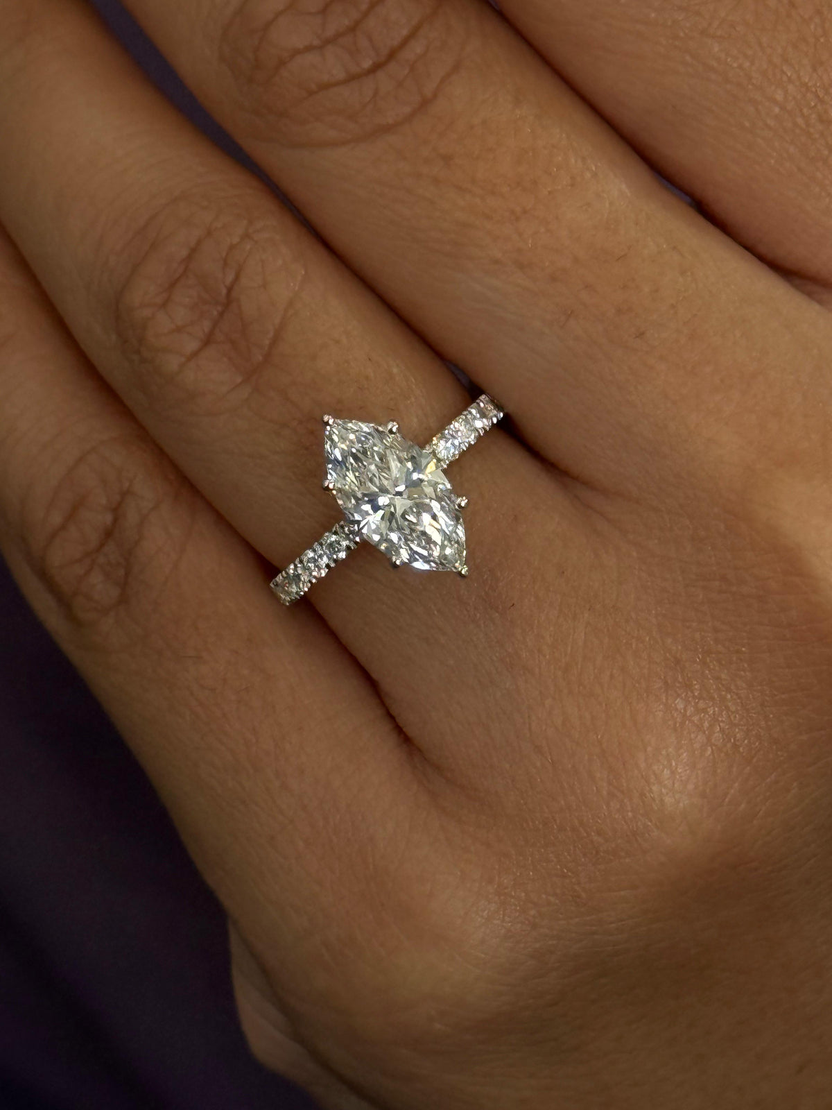 Marquise Solitaire Engagement Ring with Diamond Accents
