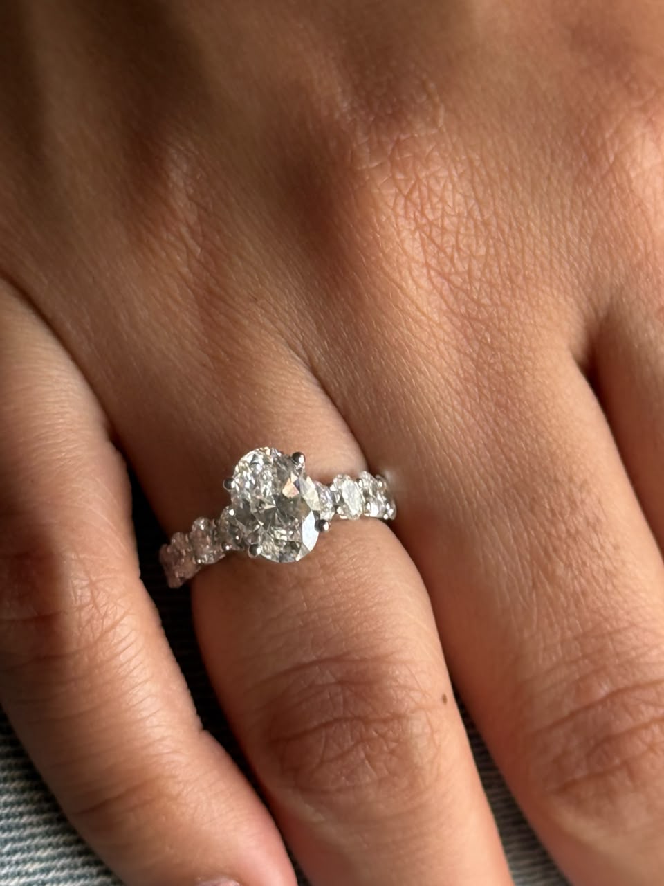 Oval Cut Diamond Ring with Diamond Accents