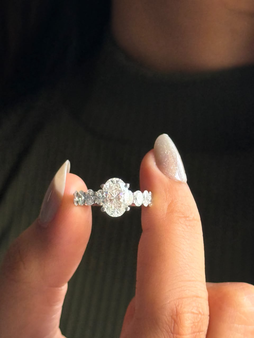 Oval Cut Diamond Ring with Diamond Accents