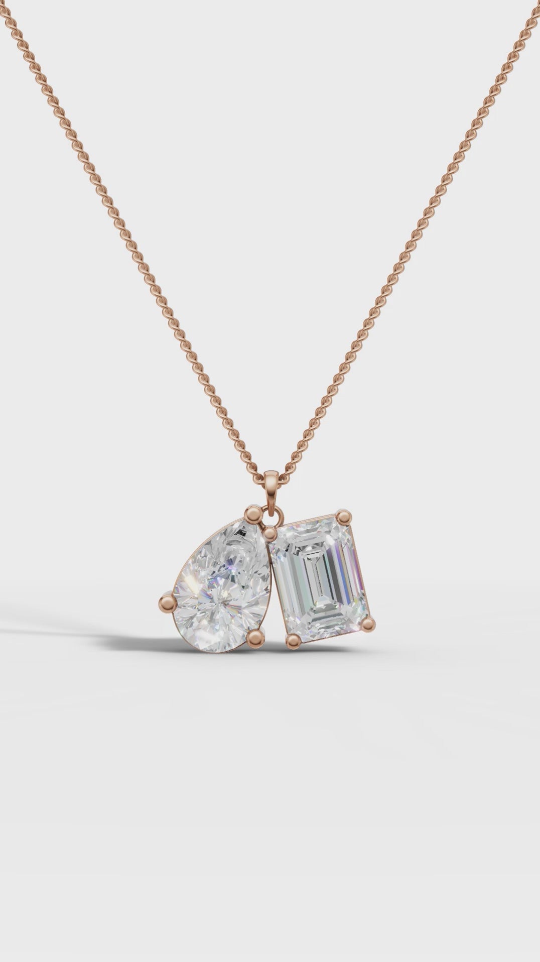 Symphony Emerald And Pear Cut Diamond Pendant