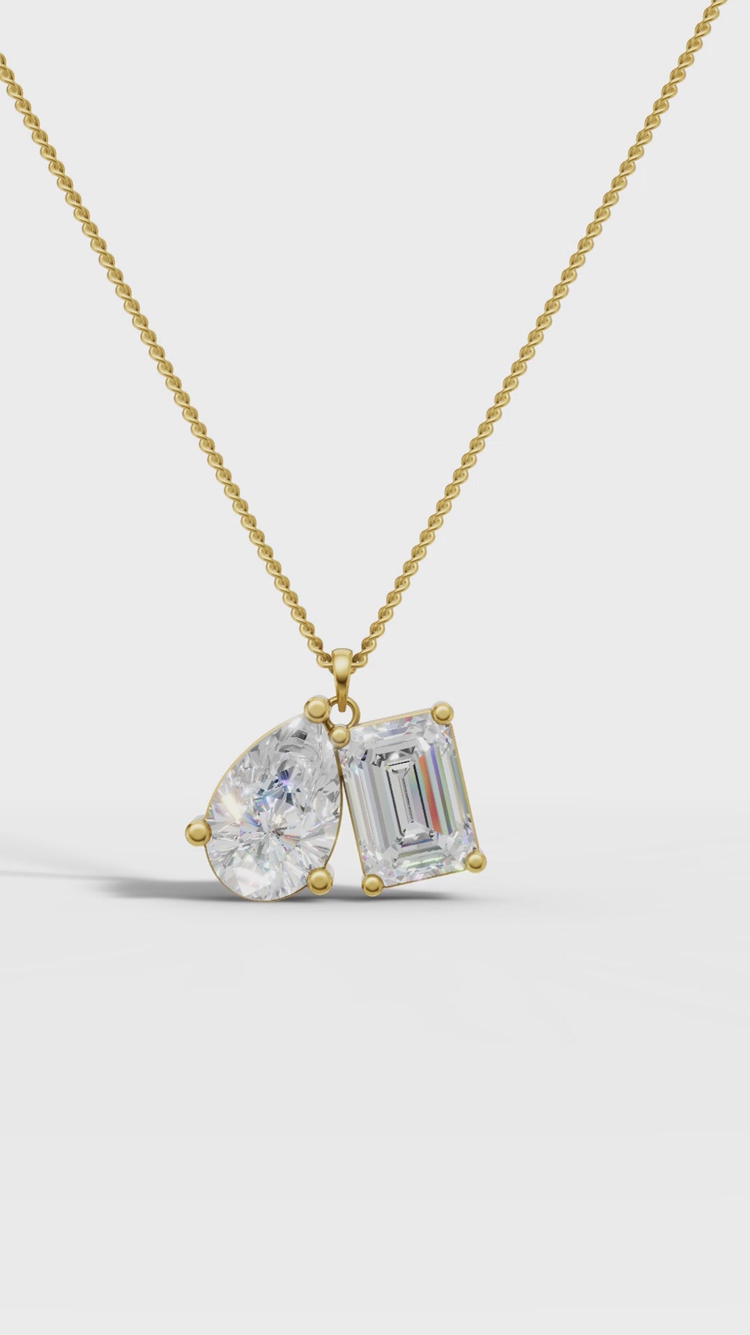 Symphony Emerald And Pear Cut Diamond Pendant