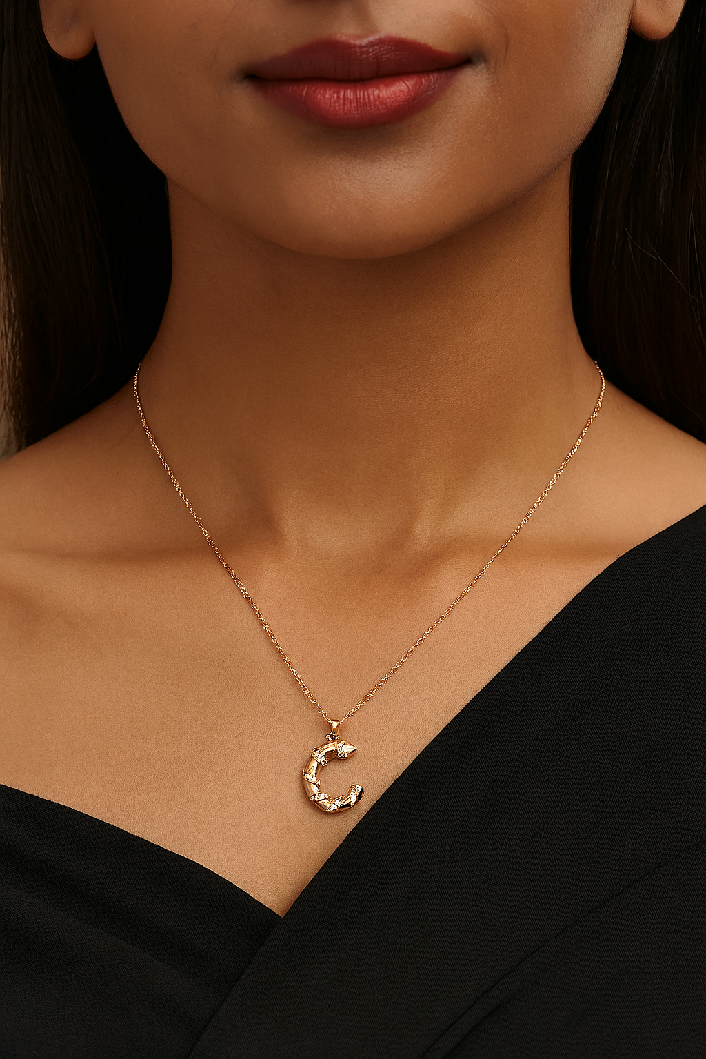 Monogram C diamond swirl pendant